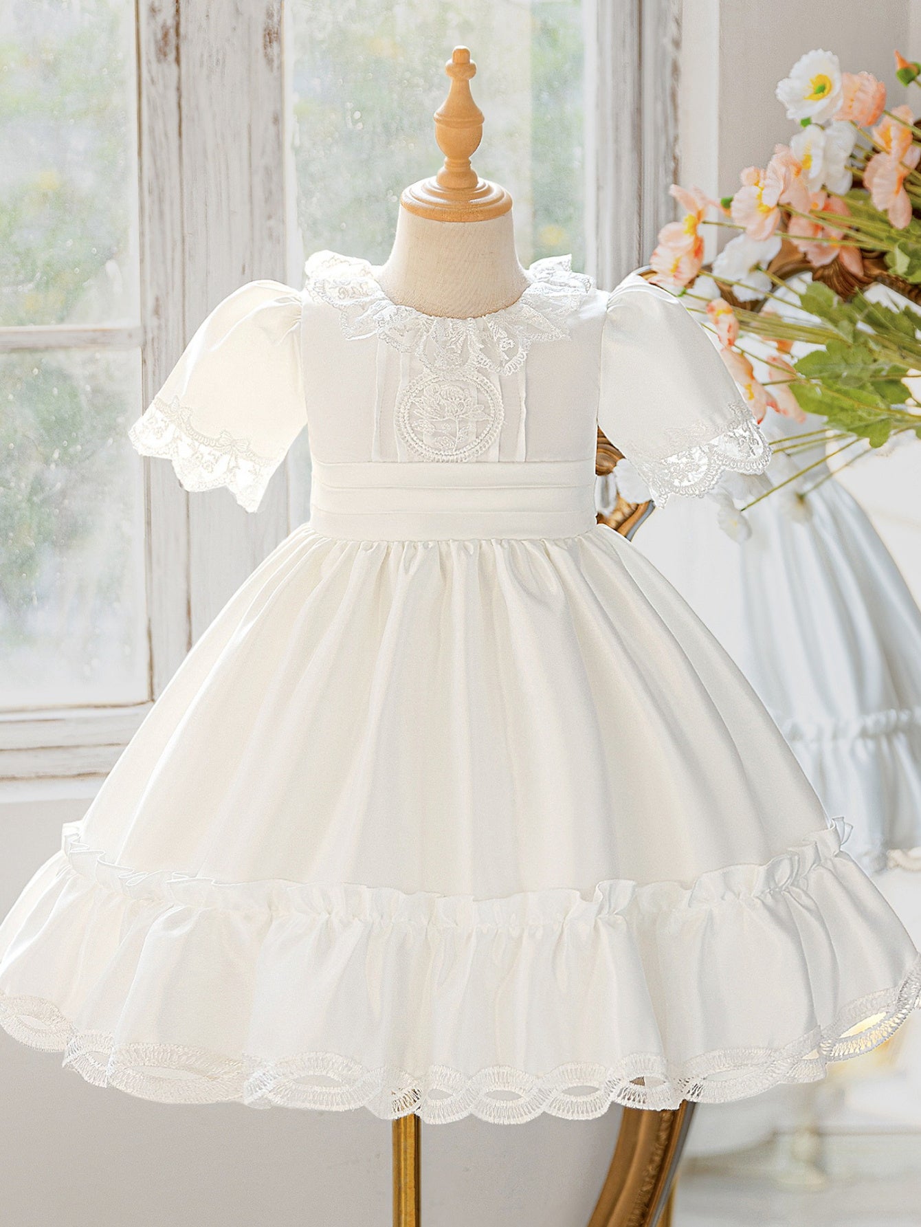 girls' dress with lace trim and embroidery
