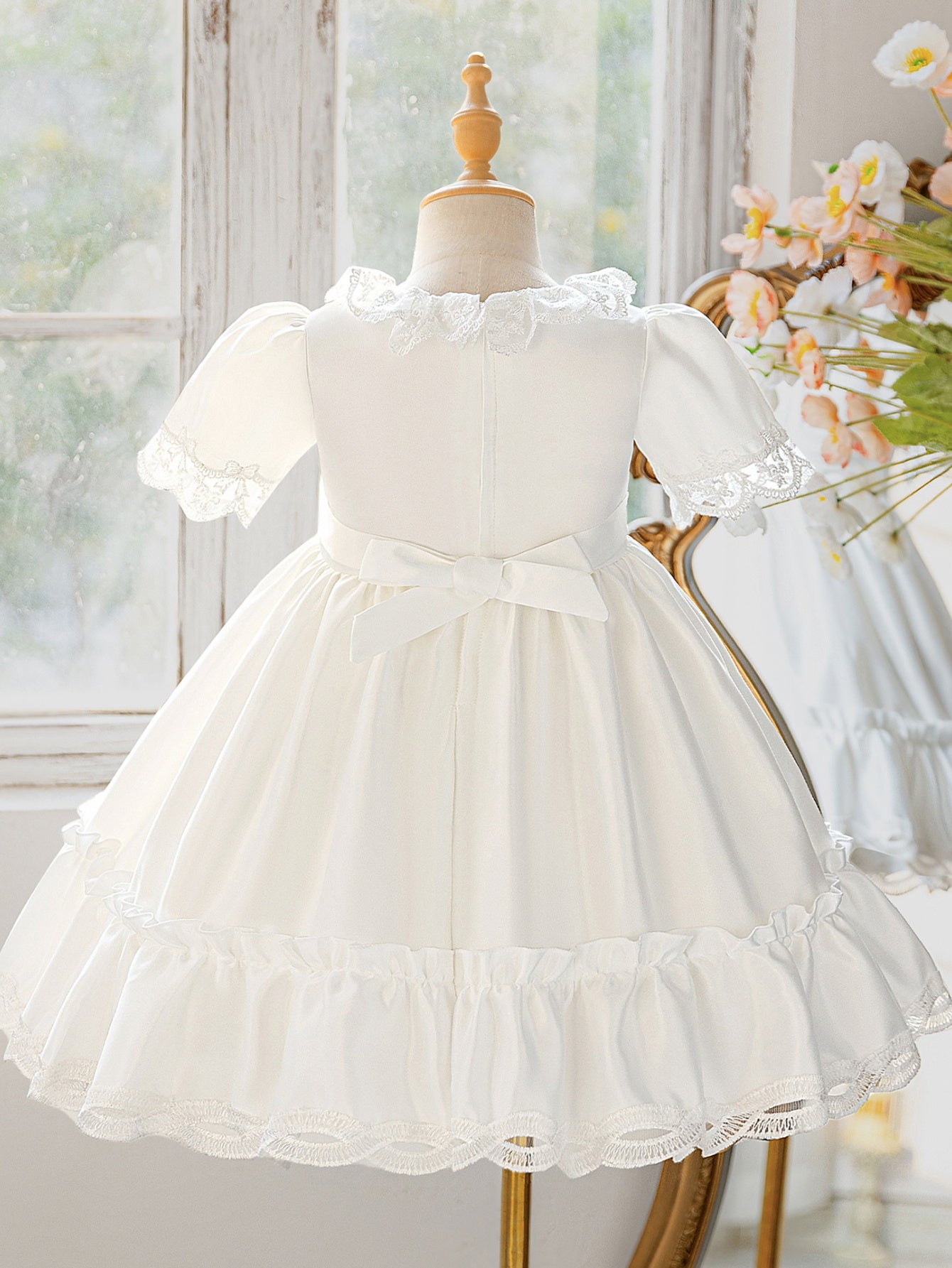 girls' dress with lace trim and embroidery